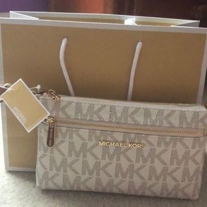 Michael Kors “Jet. Set. Travel” Wristlet Purse